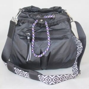 lululemon athletica Black Crossbody Drawstring Bag with Patterned Strap